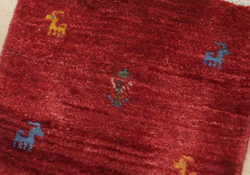 Rug in red tones